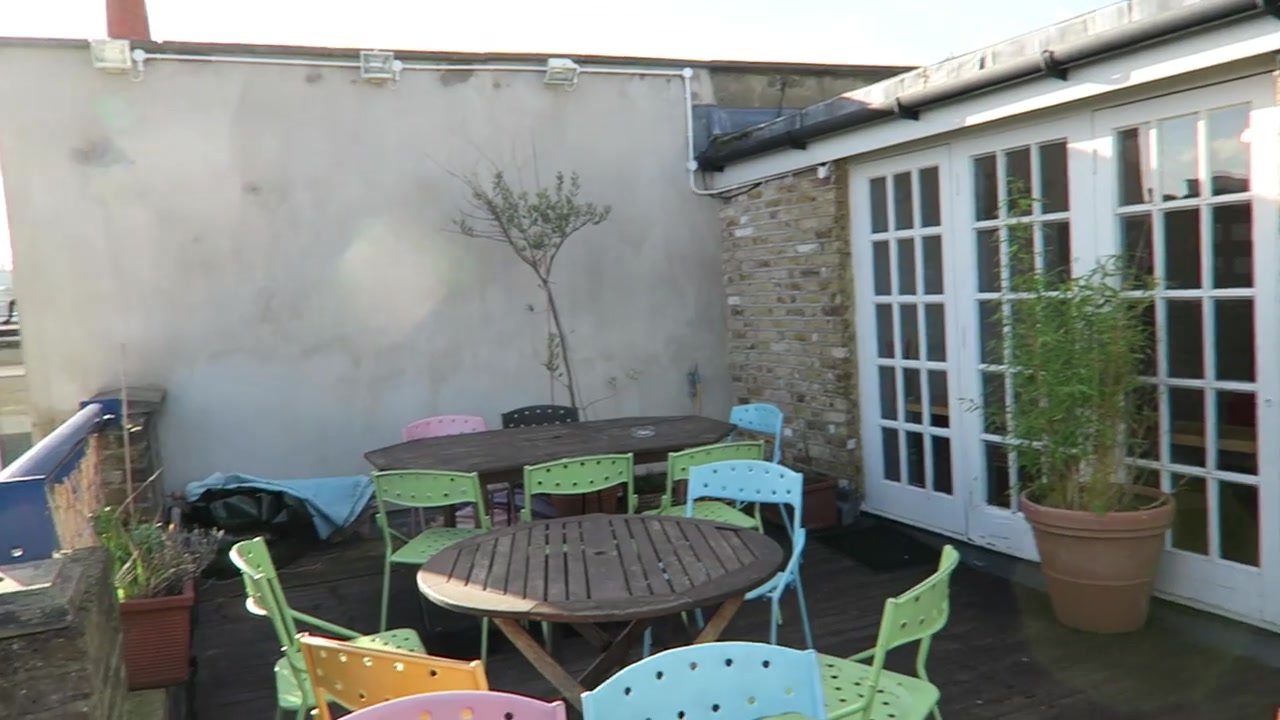 Colourful tables on the rooftop terrace at Alfies Antique Market