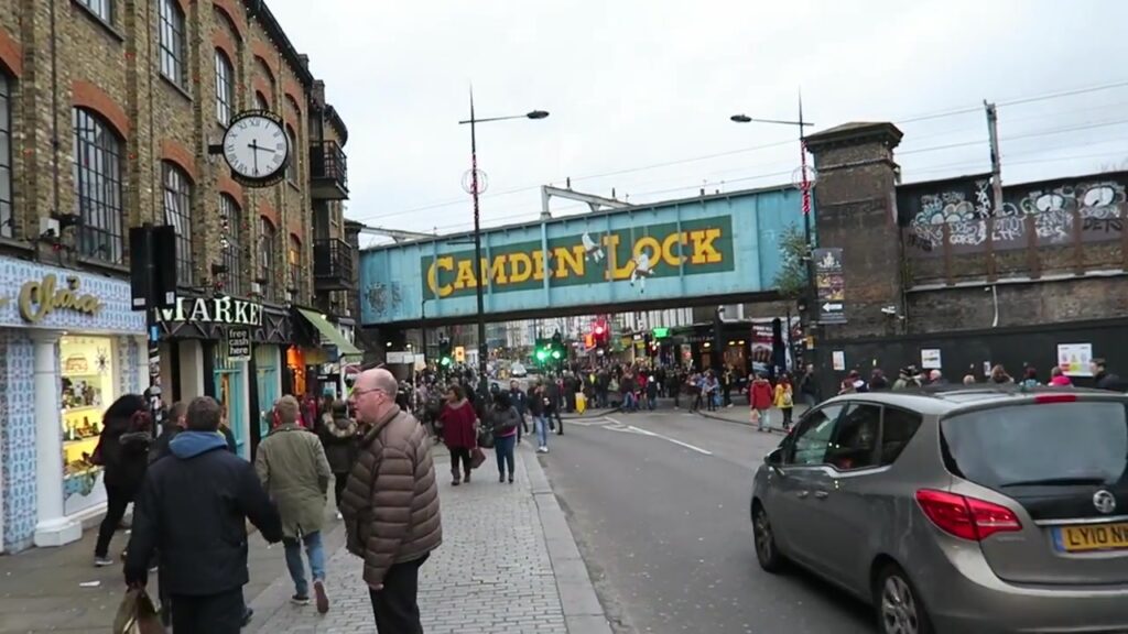 Camden Lock railway bridge lettering above the busy street in December 2015.