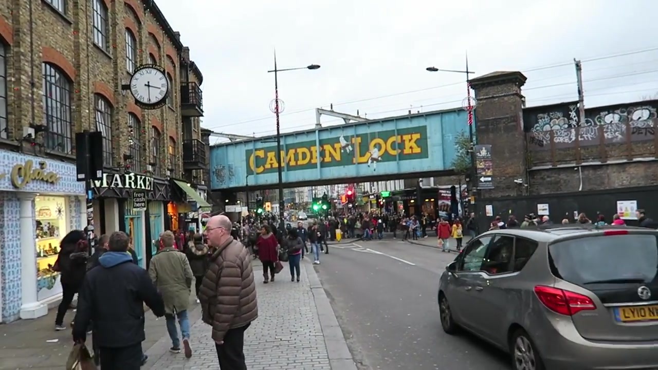 Camden Lock railway bridge lettering above the busy street in December 2015.