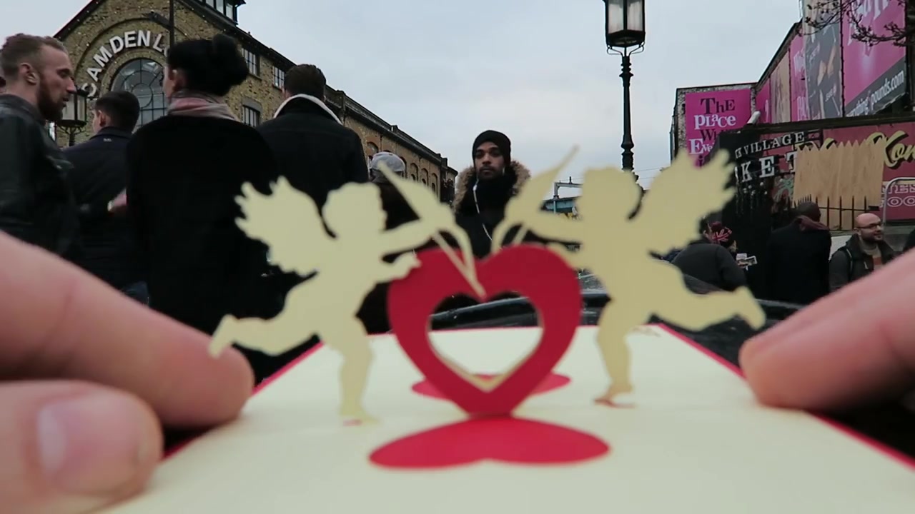 Pop-up Valentine card with cherubs and a red heart beside Camden Lock