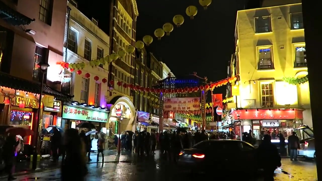 Lanterns and illuminated restaurants in London Chinatown at Chinese New Year 2015
