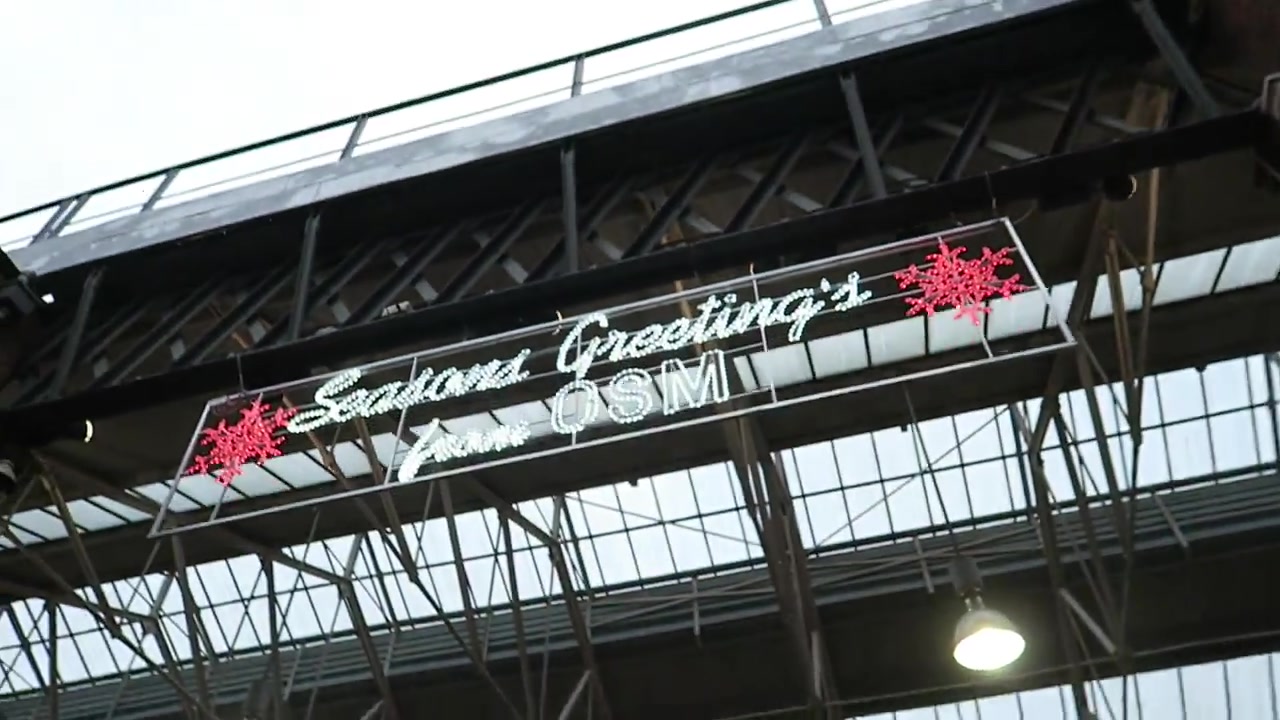 Season’s Greetings sign beneath the roof of Old Spitalfields Market in 2015.