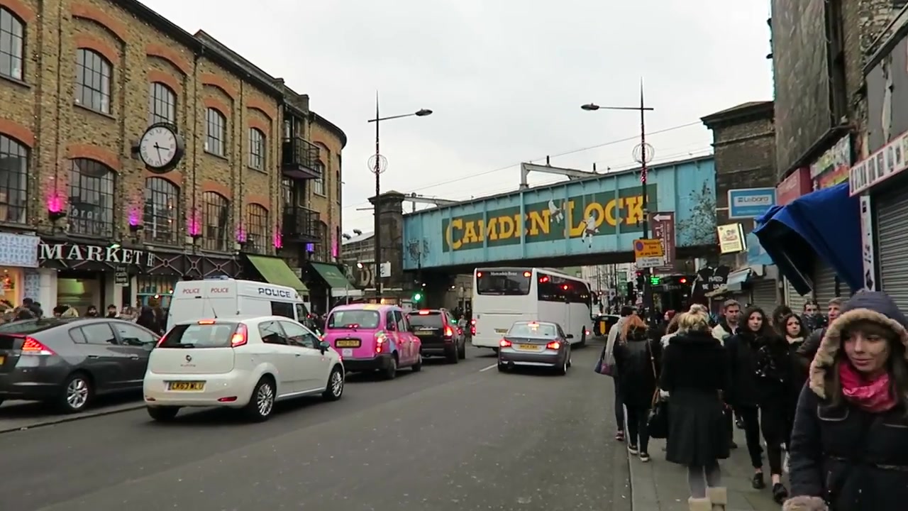 People and traffic below the Camden Lock railway bridge in 2015