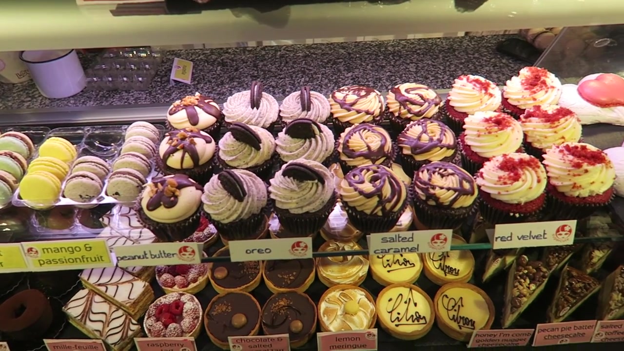 Cupcakes and macarons in the Supercute display at Pop Brixton