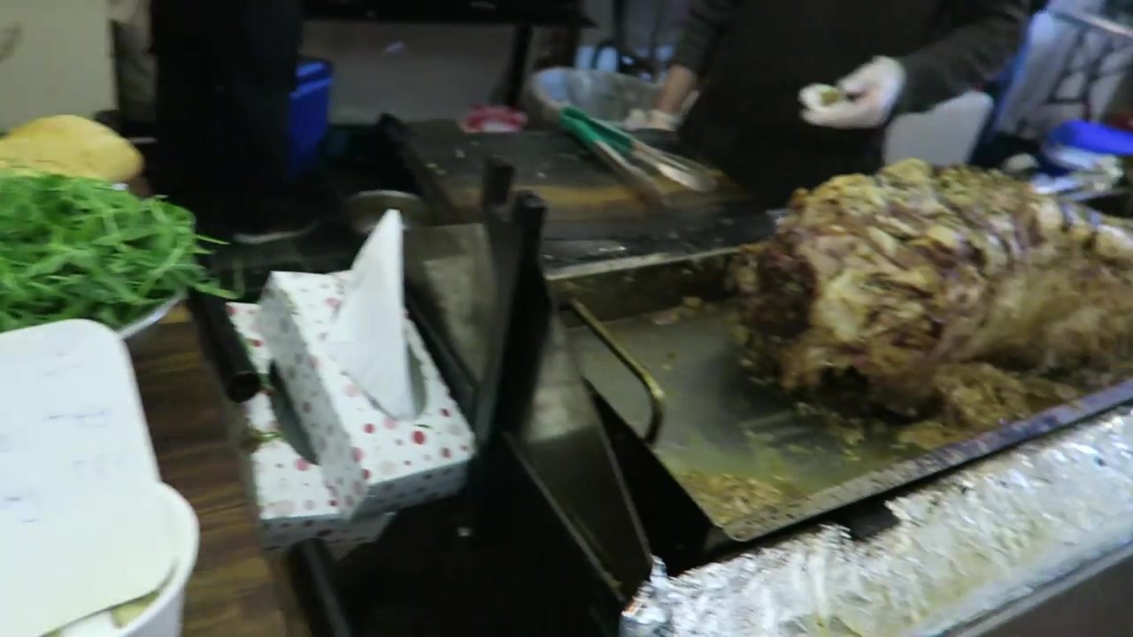 Roast pork being carved at a South Bank food stall in 2015