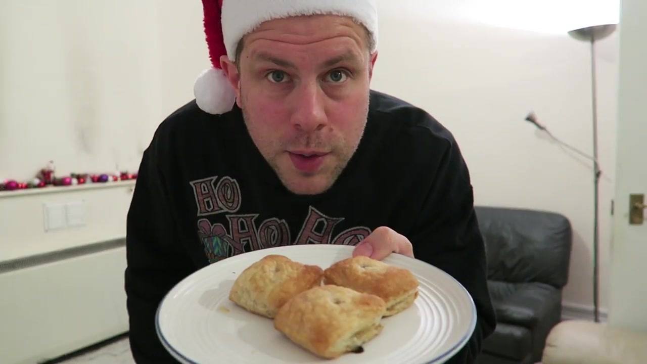 Barry shows bite-sized beef Wellingtons on a white plate.