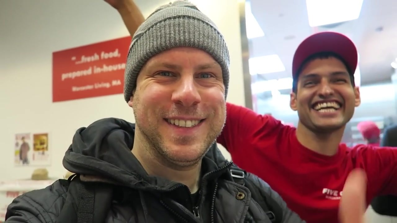 Barry Roberts and a smiling Five Guys team member in Covent Garden in 2015.