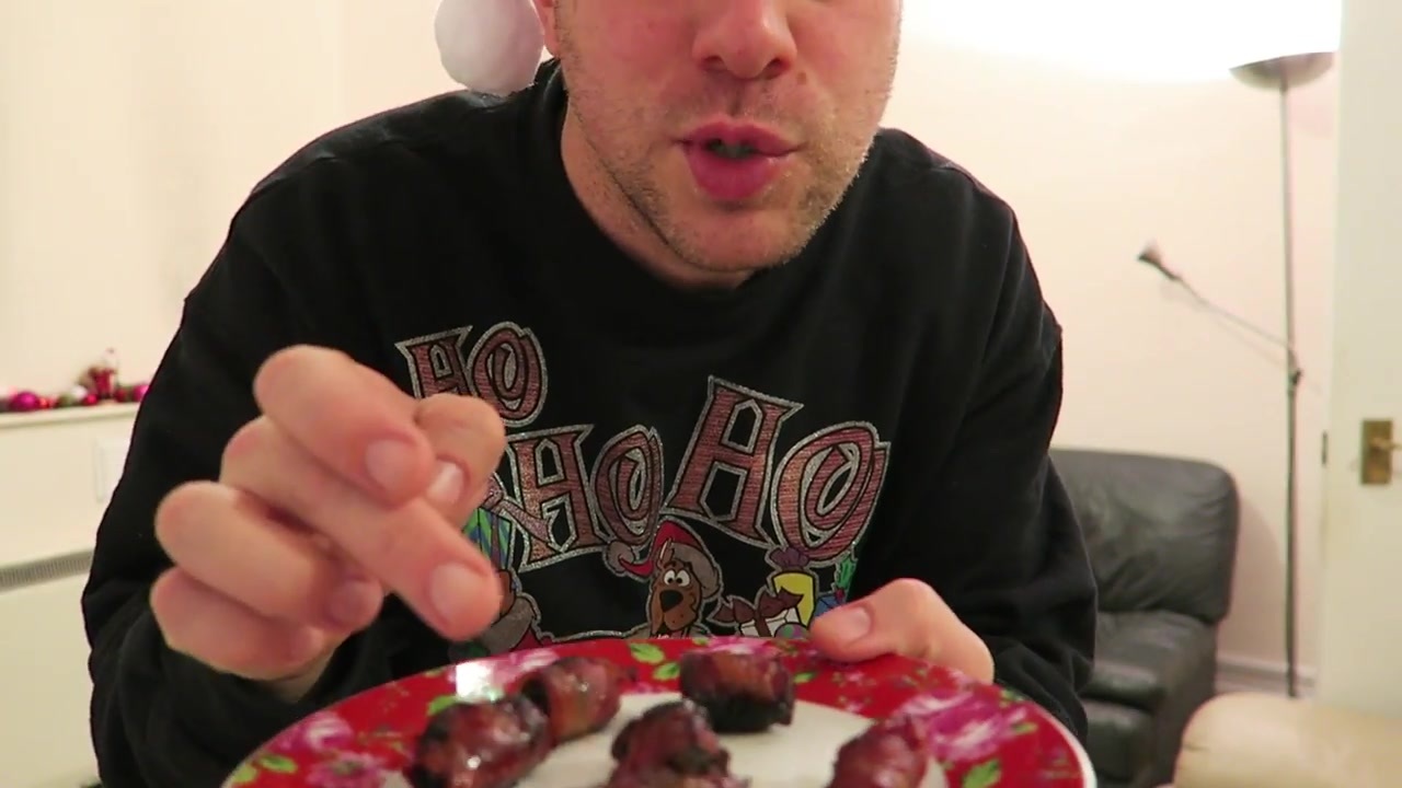 Barry shows bacon-wrapped prunes and oysters on a festive plate.