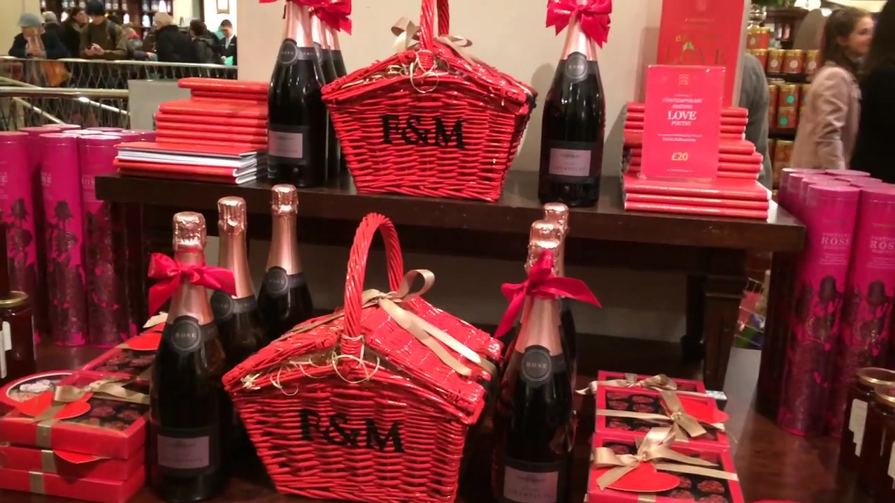 Red Valentine hampers and Champagne bottles displayed at Fortnum and Mason