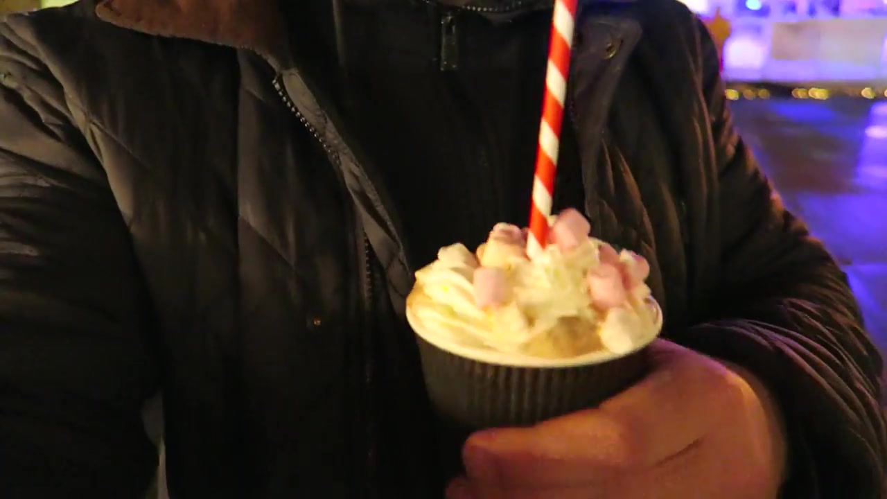 A hot chocolate topped with cream