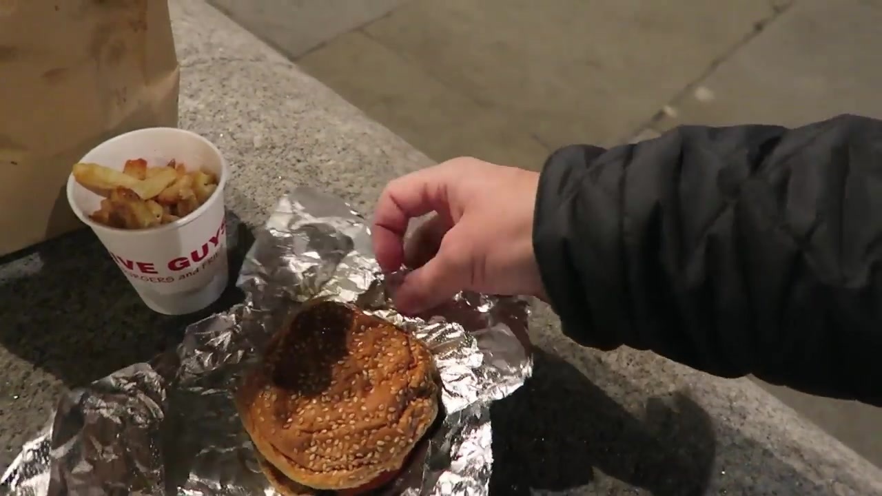 A Five Guys hamburger and cup of fries during the Covent Garden visit.