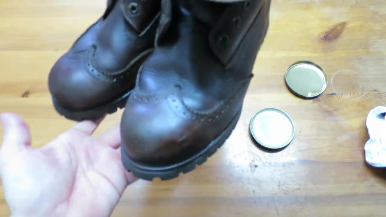 Pair of brown leather boots after the Waximum treatment