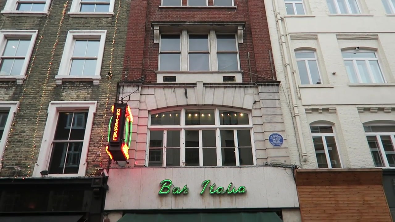 Bar Italia green sign, illuminated coffee sign and blue plaque on Frith Street