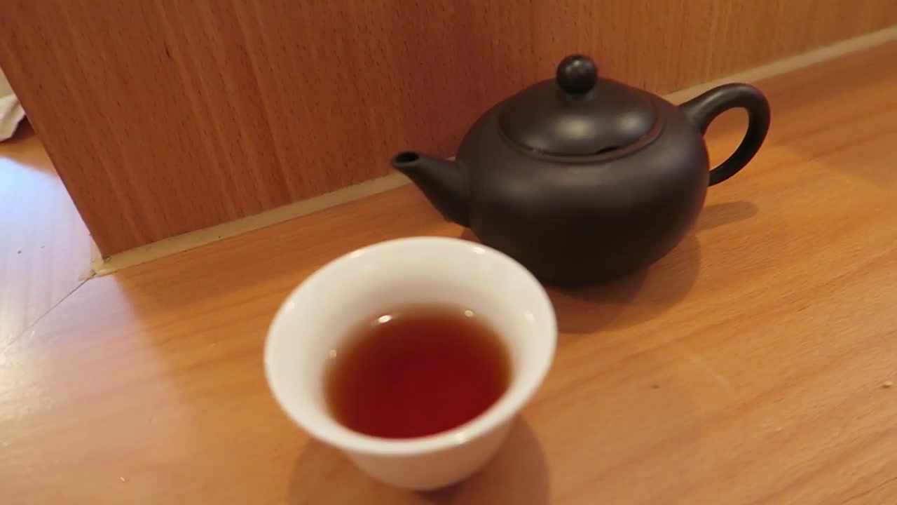 Small teapot and cup of oolong tea at BAO Soho