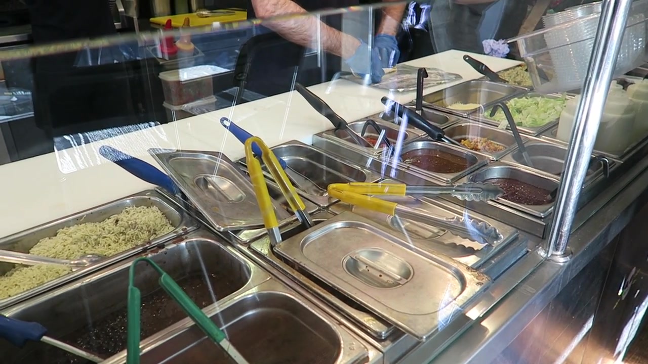 Burrito fillings arranged at the Daddy Donkey counter in 2016