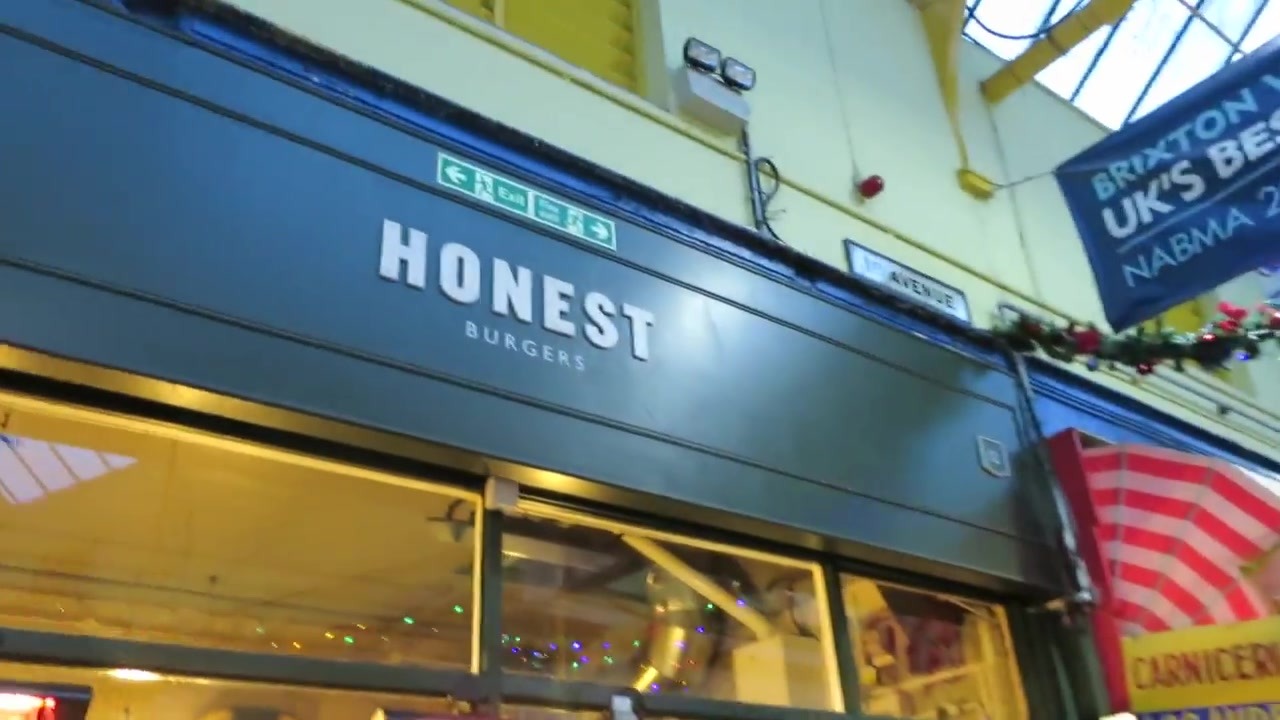 Honest Burgers sign above the Brixton Village restaurant