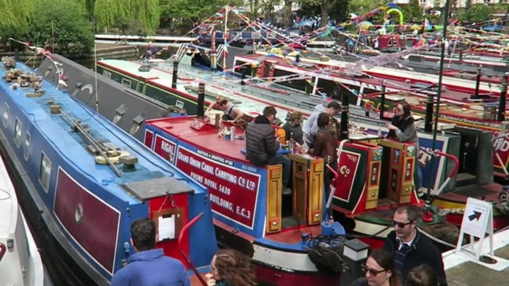 Colourful narrowboats moored together for Canal Cavalcade 2016