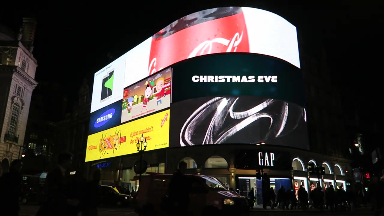 Christmas Eve title composited into the Piccadilly Circus billboards in the 2015 film.