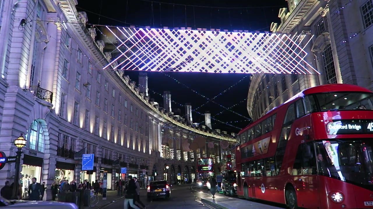 Regent Street Christmas decorations and a red bus in the edited Vlogmas montage.