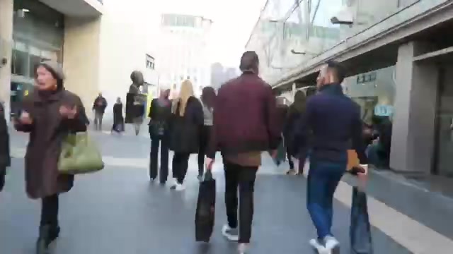 Visitors walking among the stalls at Southbank Centre Market.